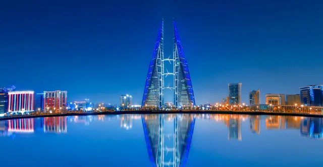 Bahrain World Trade Center lit up at night, Manama