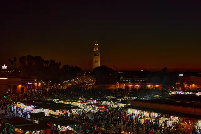Jemaa el-Fna square at dusk with the Koutoubia minaret, Marrakech