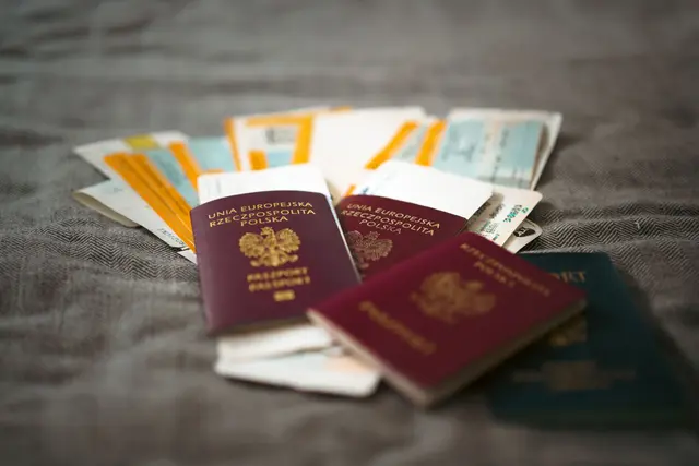 Passports and travel tickets laid out ready for an application